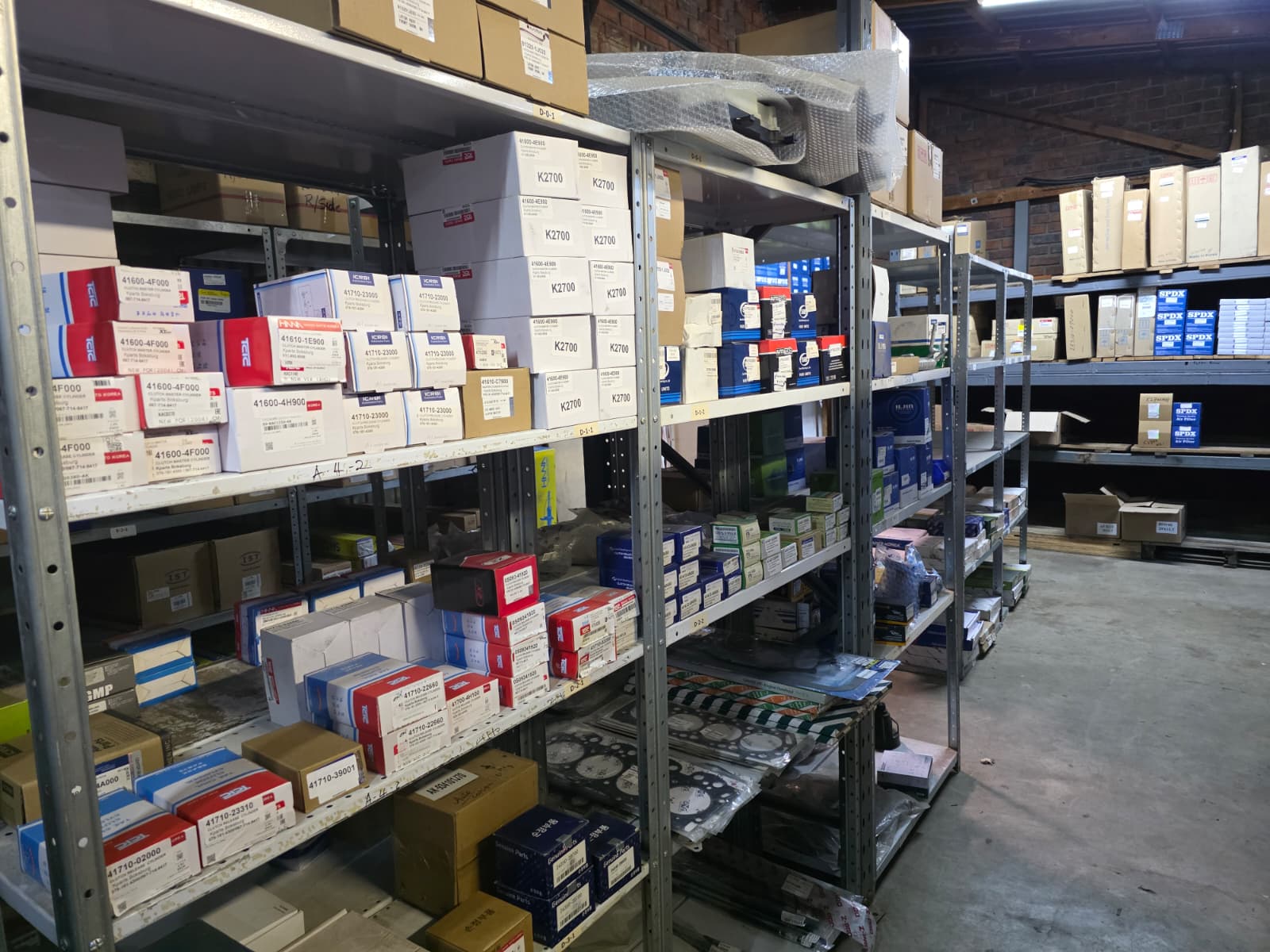 Parts wall shelving with stock