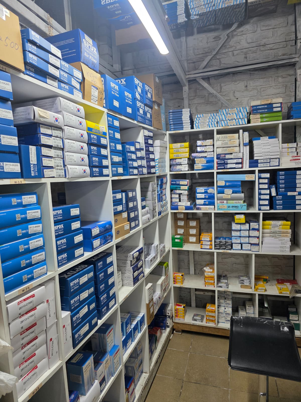 Parts wall shelving with stock
